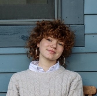 female student with curly hair
